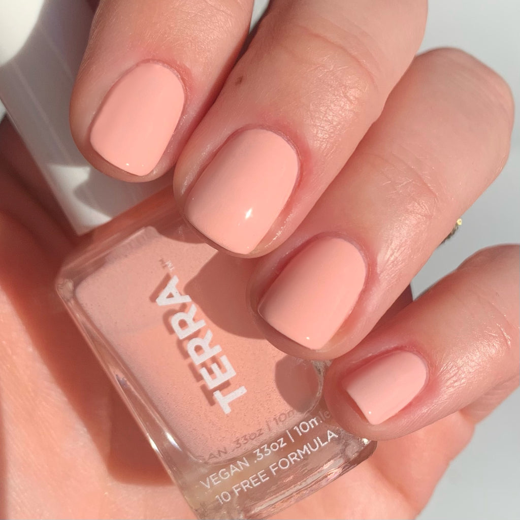 Terra nail polish number23 pink peach color swatched on nails.