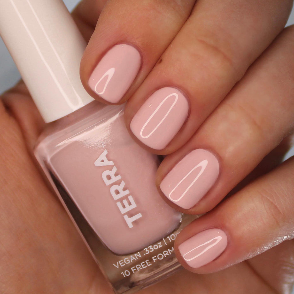 Terra nail polish number 8 soft pink color swatched on nails.
