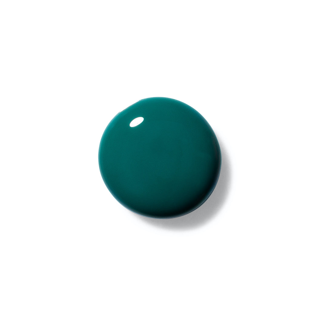 Terra nail polish number 29 emerald green swatched as circle.