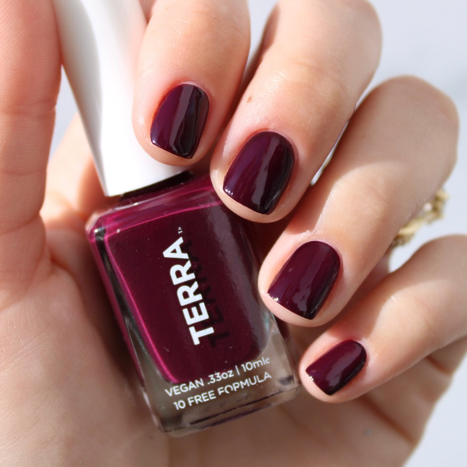 Terra nail polish number 15 dark burgundy swatched on nails.