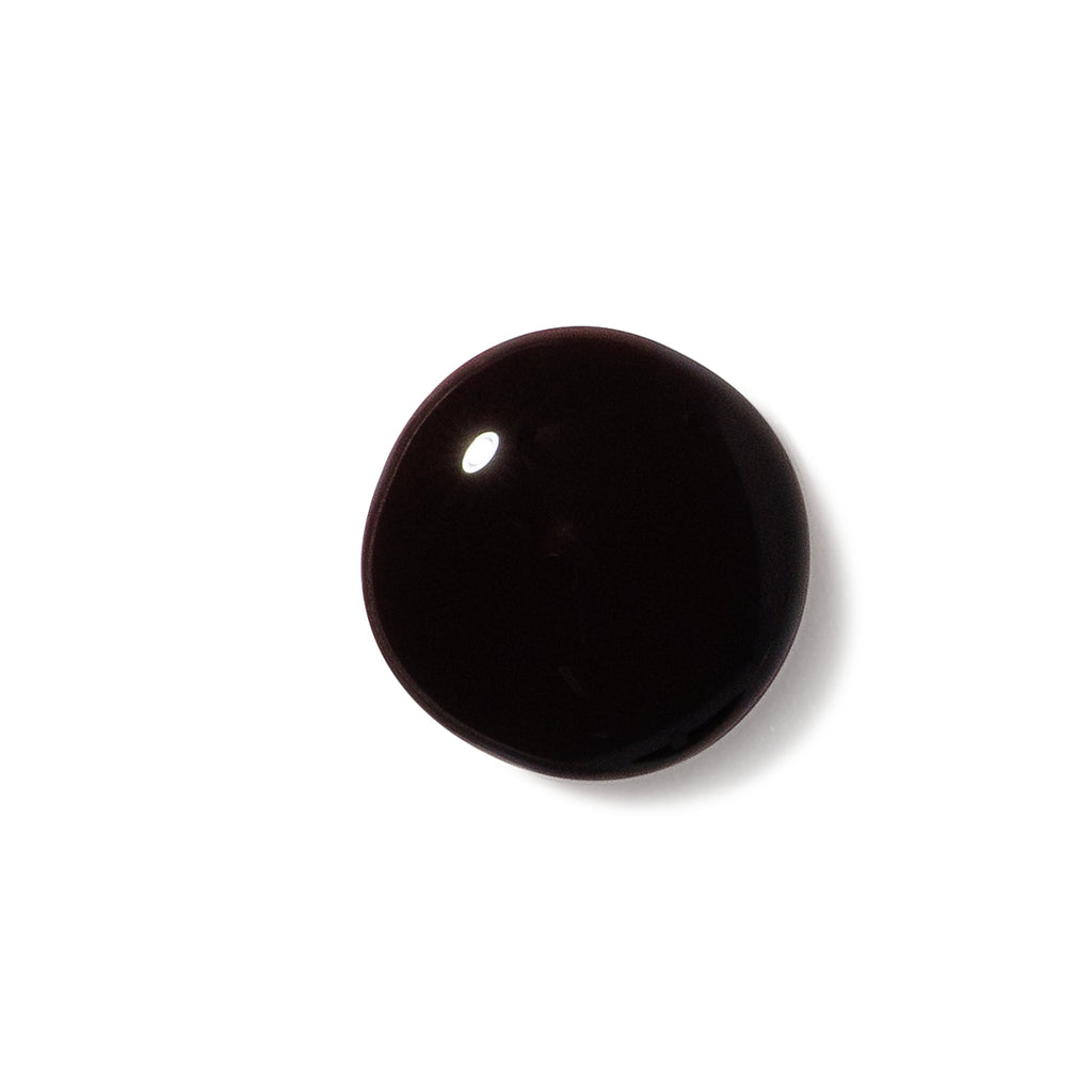Circle swatch of terra nail polish number 12 dark burgundy.