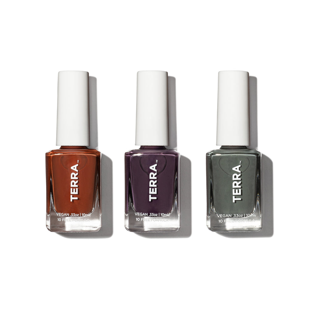 Terra fall nail colors in glass packaging and white caps of number 37 Sea Glass Olive (a neutral green that looks like a moss sea glass and olives), number 38 Burnt Oranges (a dark orange hue that looks like burnt oranges) and number 39 Mauve