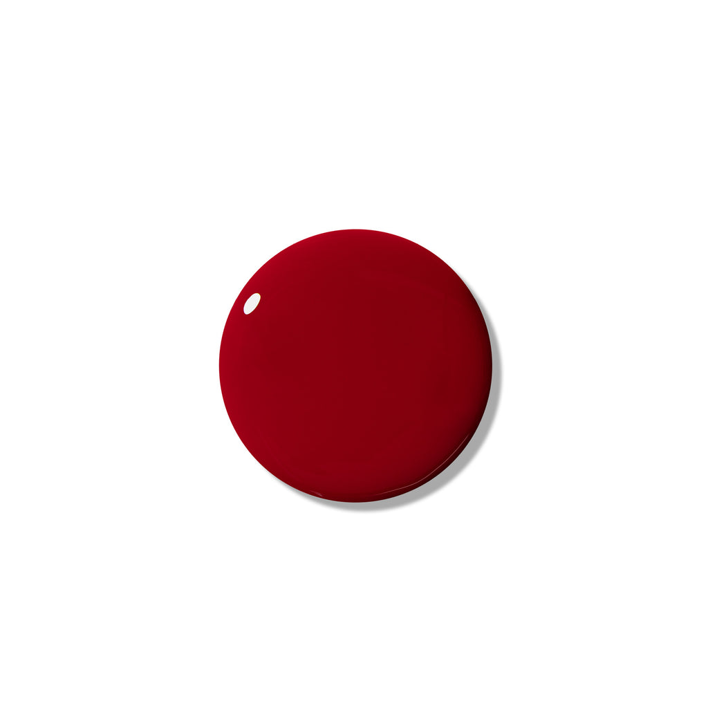 Circle swatch of No. 46 Crimson (a captivating red wine hue).